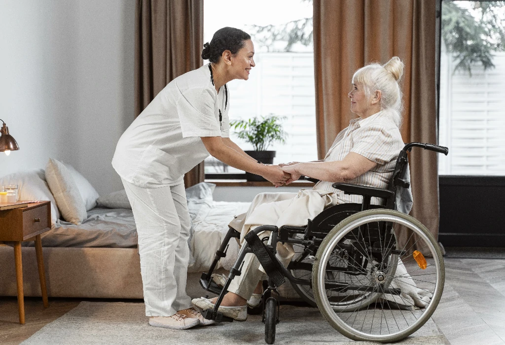 doctor-talking-with-her-elder-patient~1