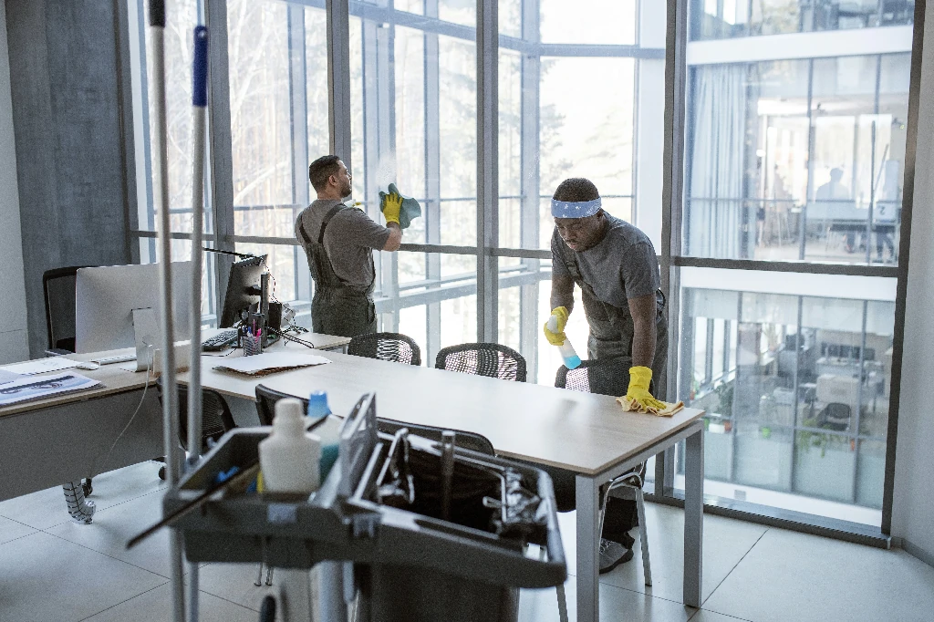 full-shot-men-cleaning-office~1